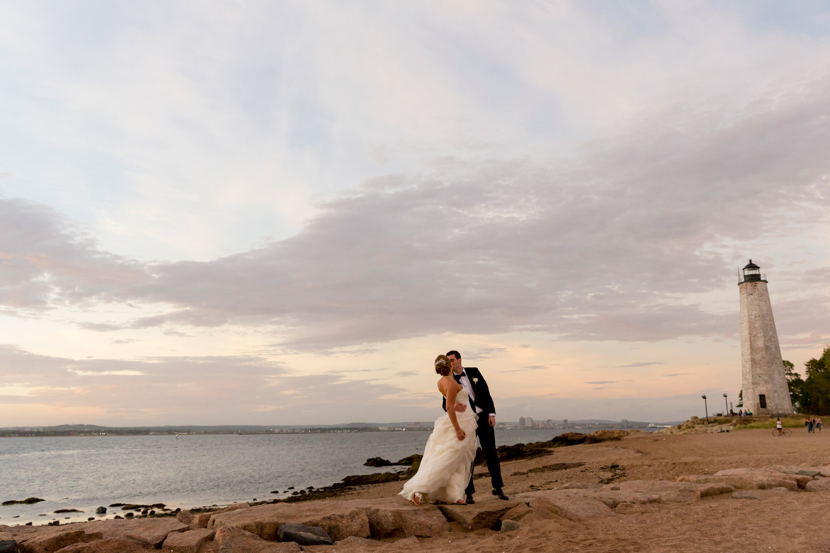 bride-groom-sunset-beach-Carousel-Lighthouse-Point-CT-sarma-and-co